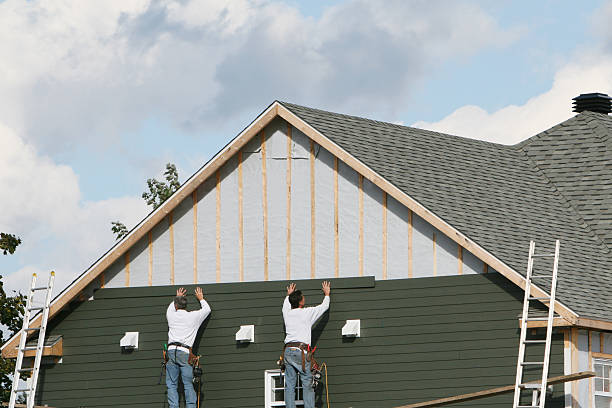 Professional Siding technician working in Cedar Grove, FL